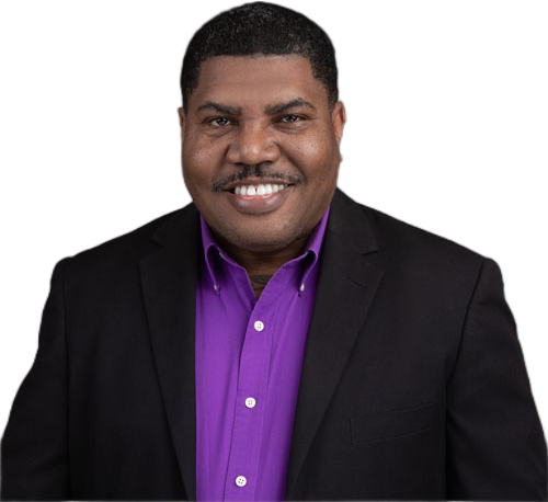 Anthony E. Dixon, PhD, in a black jacket and purple shirt.